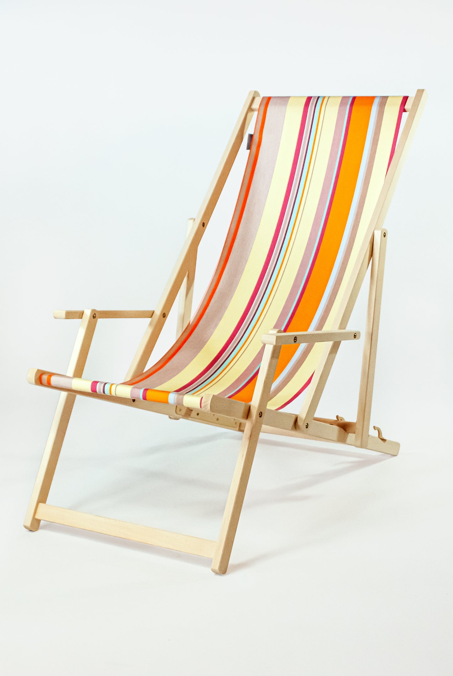 beach chair with armrest June sunset